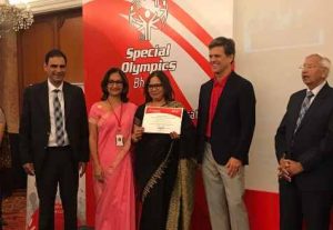 Dr Kartikay Saini - Receiving Unified Champion School Award from Mr. Tim Shriver Chairman Special Olympics International